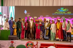 Federal-Minister-of-Education-and-other-traditional-and-state-dignitaries-holding-the-trophy-with-the-winning-team-at-the-AGILE-Games-Award-Ceremony-scaled