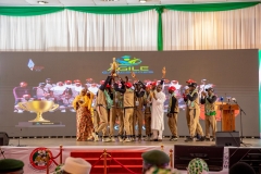 The-winning-team-holding-up-their-trophy-in-celebration-at-the-AGILE-Games-Award-Ceremony-scaled